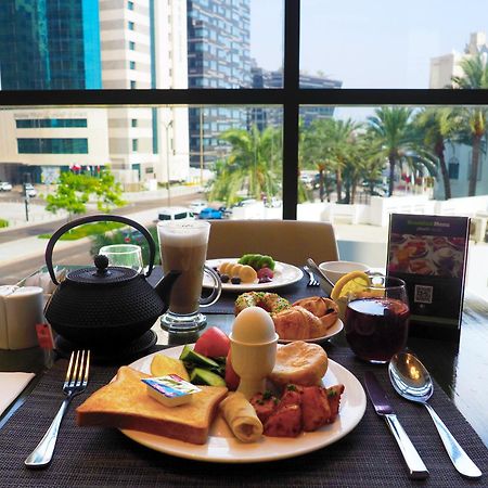 Doubletree By Hilton Doha Old Town Hotel Exterior photo A breakfast at the hotel