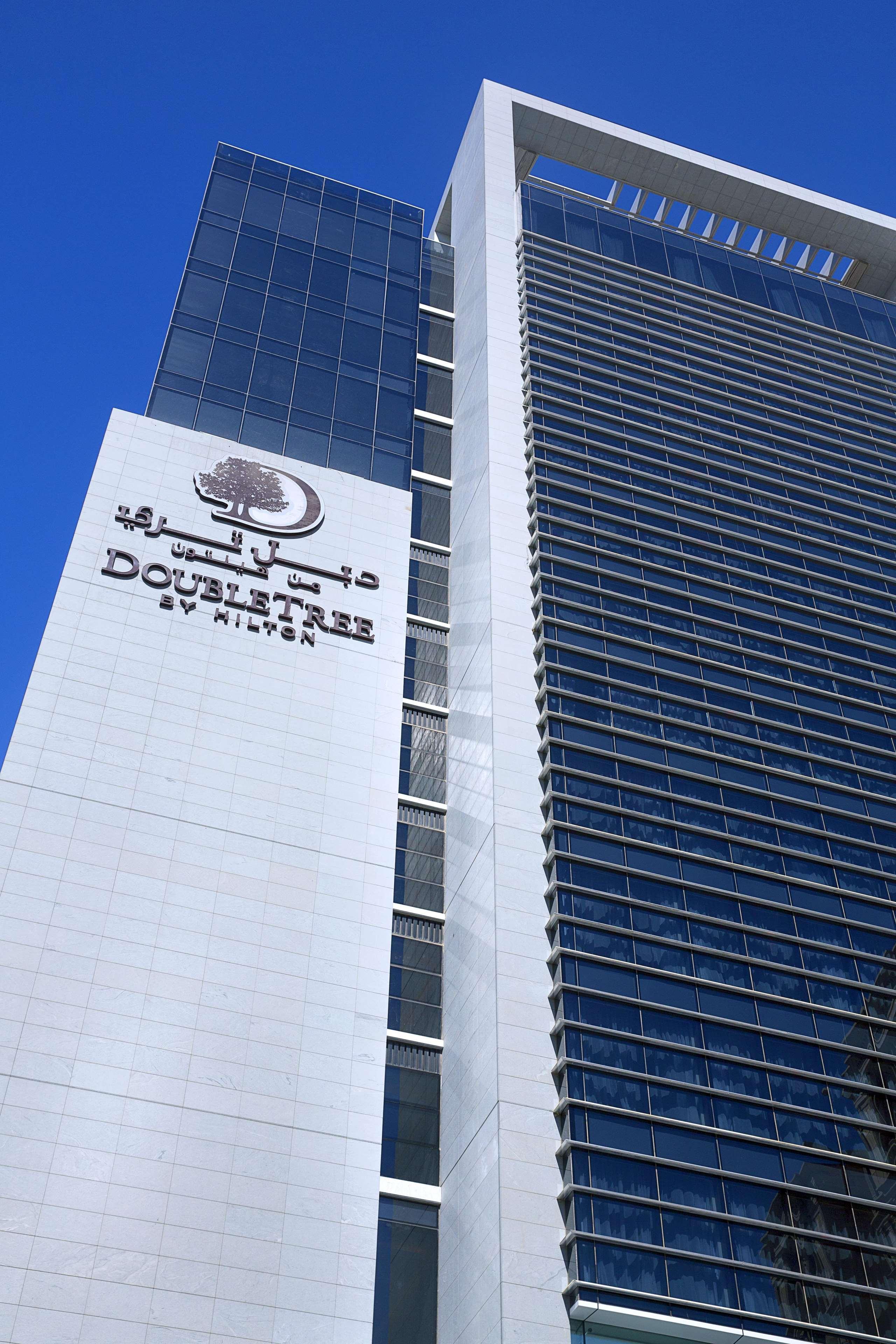 Doubletree By Hilton Doha Old Town Hotel Exterior photo Dubai Police HQ