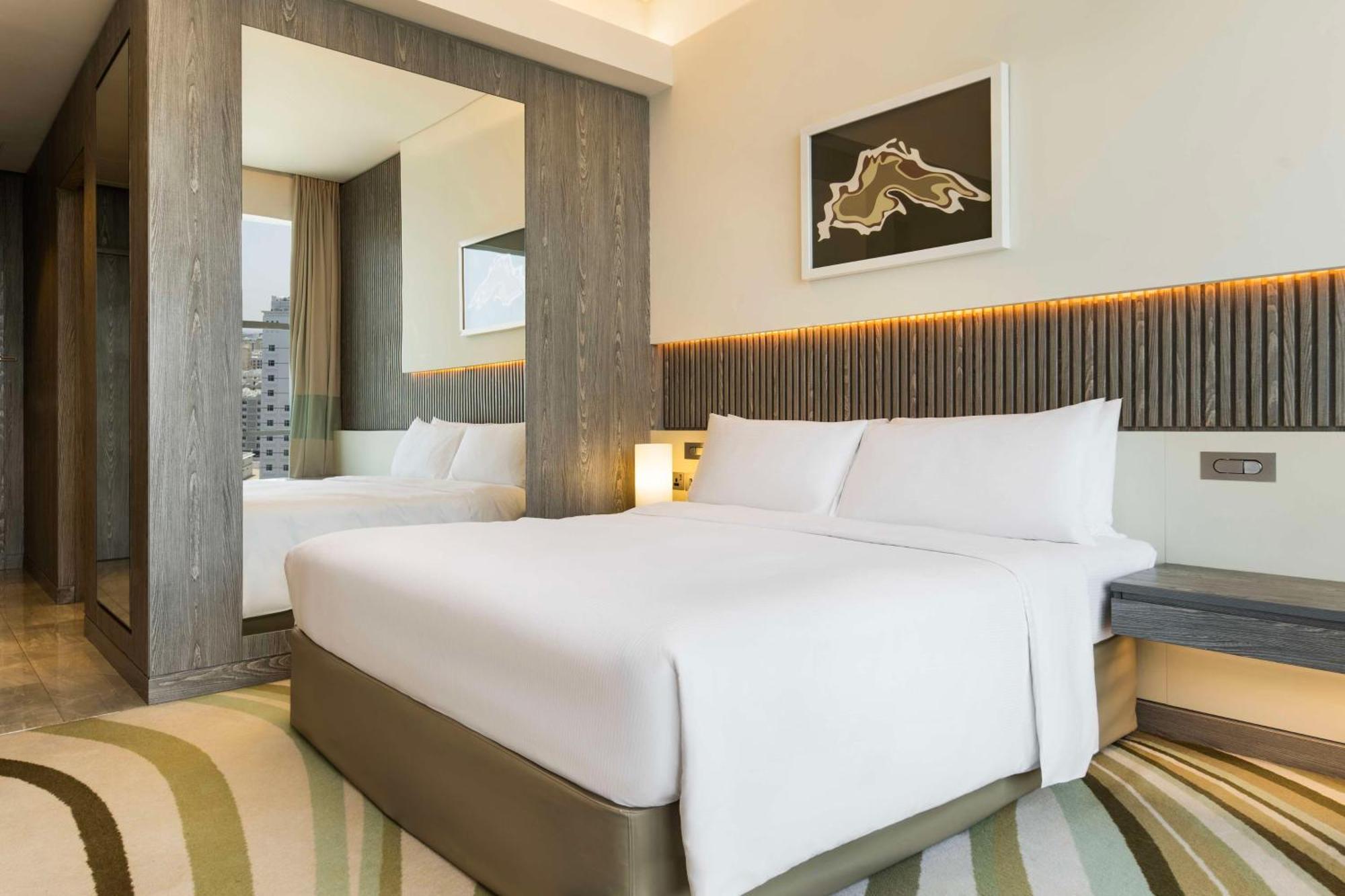 Doubletree By Hilton Doha Old Town Hotel Exterior photo A bedroom at the hotel